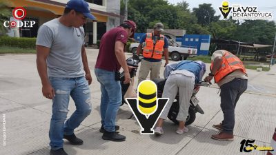 ¡Se llevó un susto! Mujer derrapa en su motoneta en plena avenida, en Tempoal