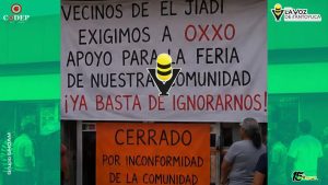 Vecinos cierran OXXO por no cooperar para Fiesta Patronal, en Huejutla