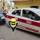 Choque entre taxi y auto compacto deja daños materiales mínimos