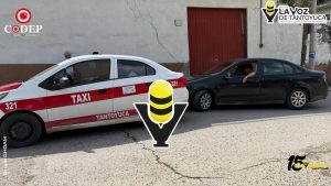 Choque entre taxi y auto compacto deja daños materiales mínimos