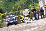 Muere hombre en la vía pública y en pleno aguacero; vecinos mueven el cuerpo y los detienen