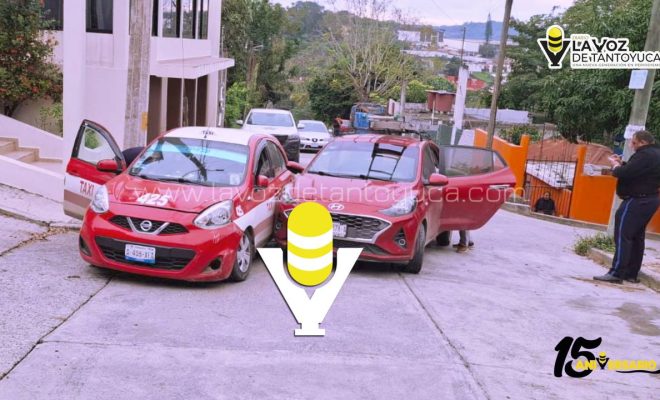 Choque entre vehículo particular y taxi deja solo daños materiales